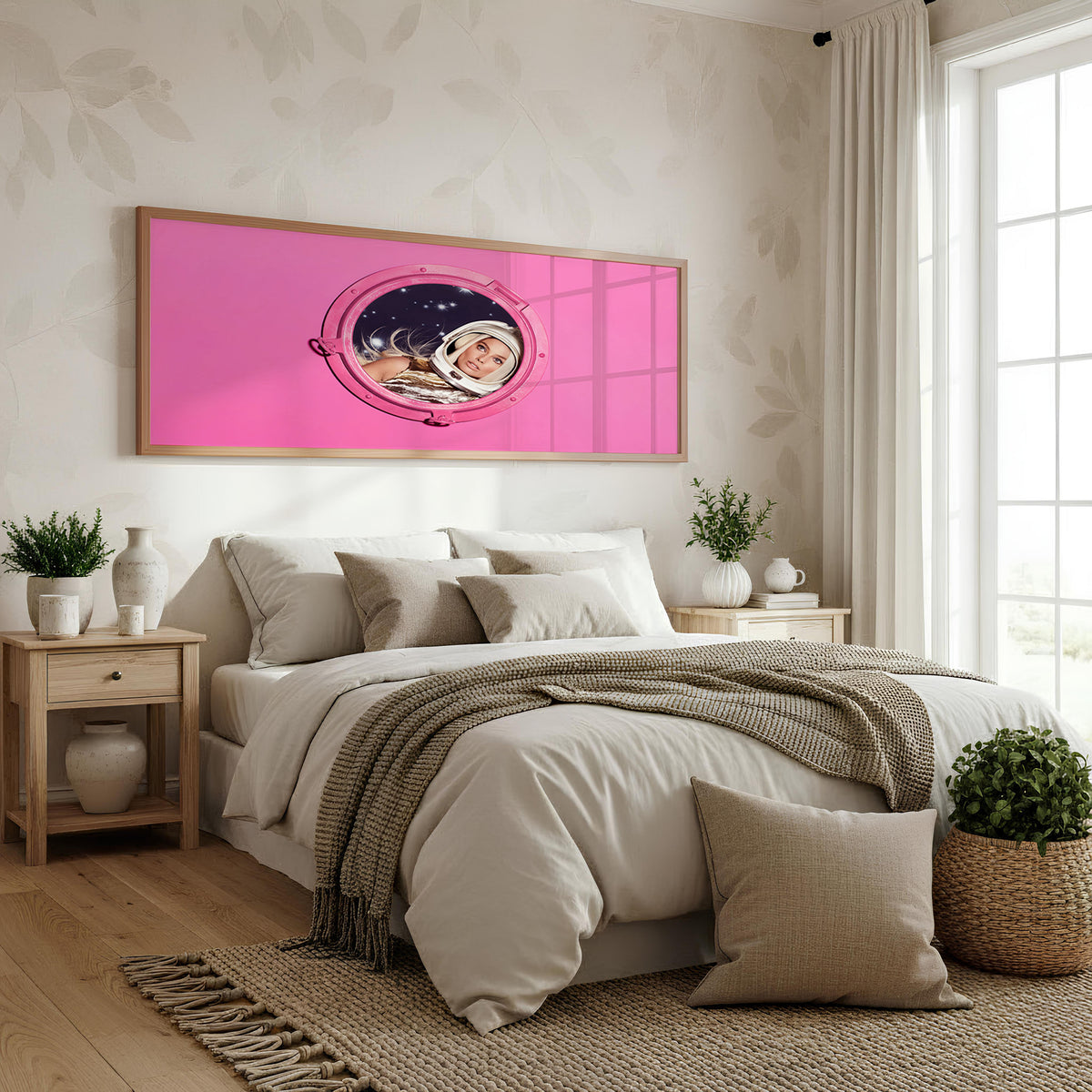 Pink Orbit Panoramic Wall Art shown in a bedroom